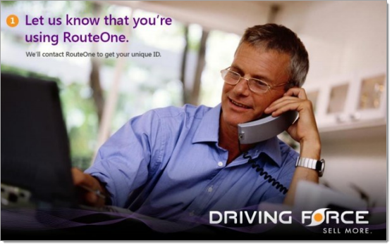 Driving Force Integration Screen Shot Man in a blue dress shirt talking on a silver corded phone while using a laptop.